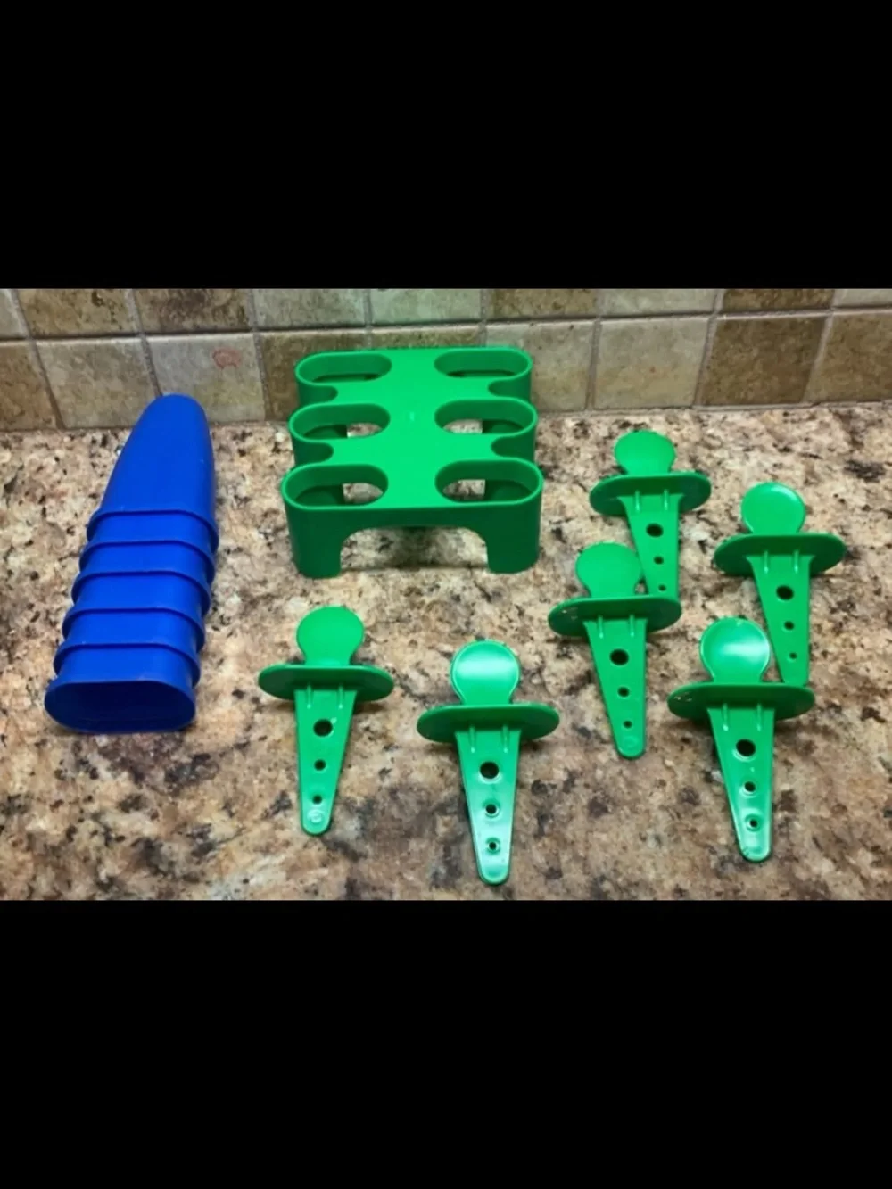 IKEA Plastic Popsicle Maker Molds in Green with Blue Covers and Green Tray.